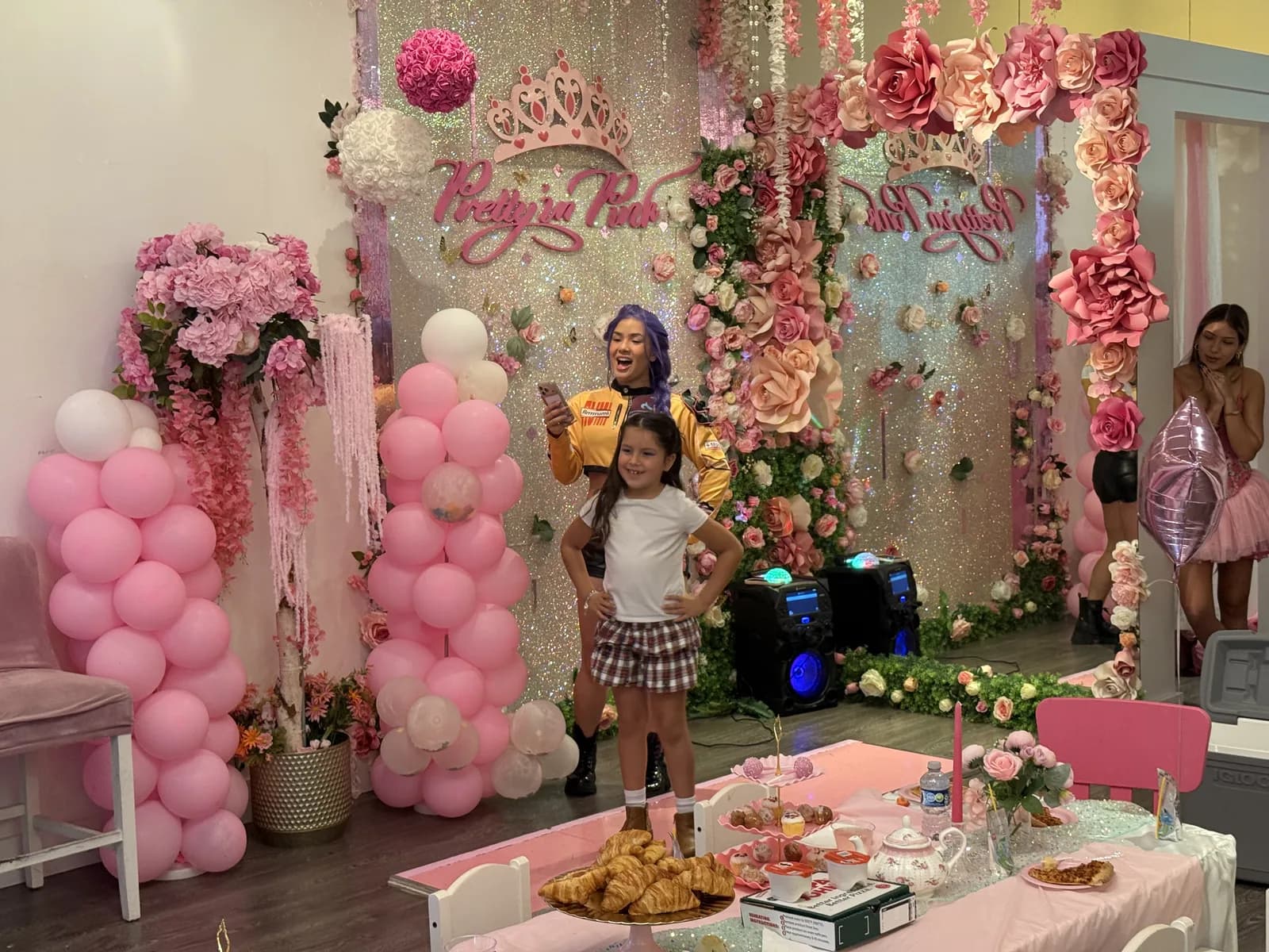 Girl posing with a princess character during a Mommy and Me spa day in Fort Lauderdale