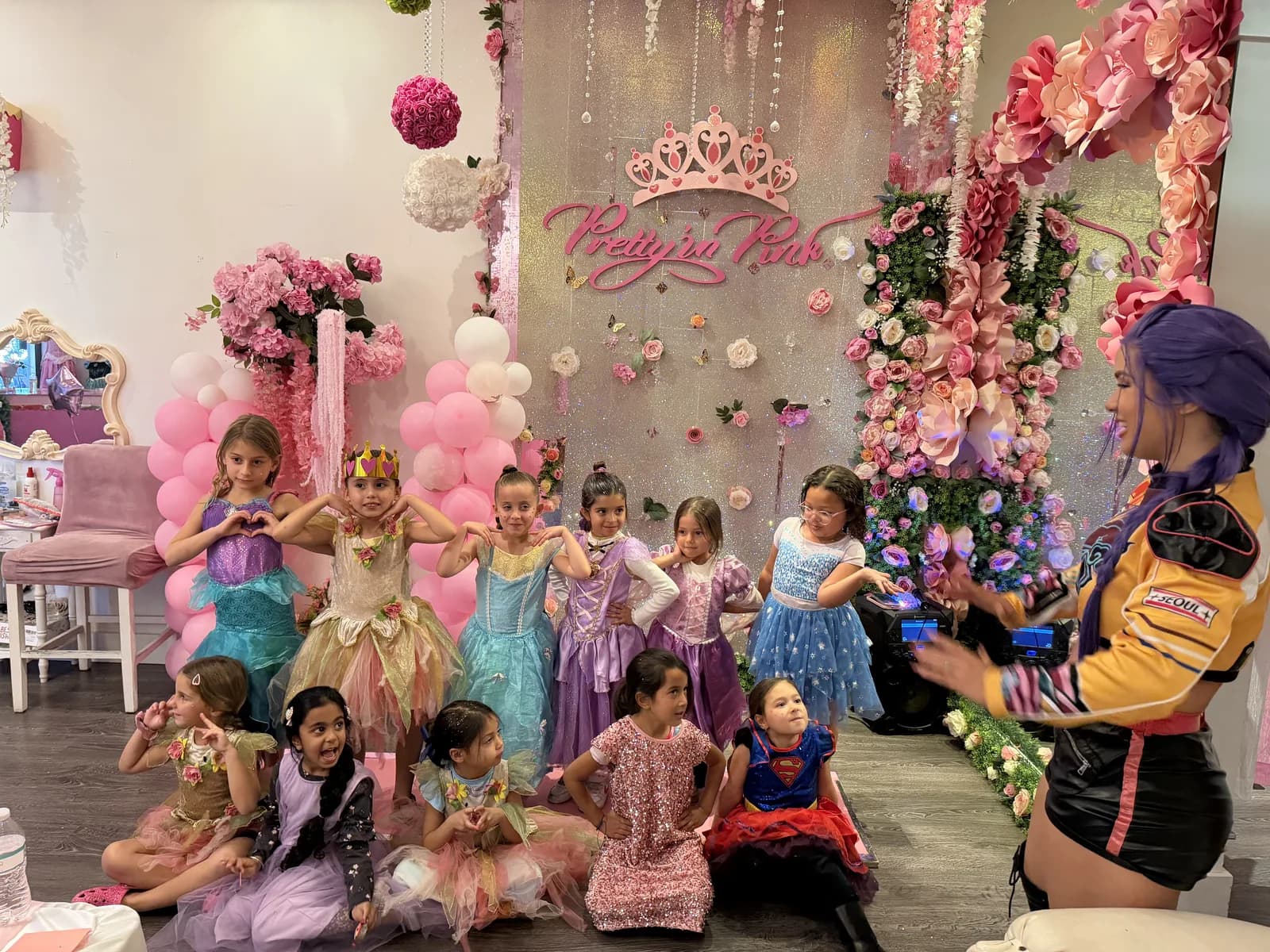 Girls working on craft projects at a birthday party in South Florida